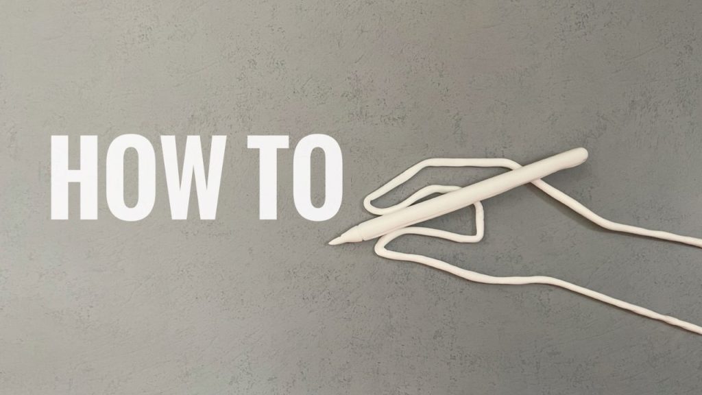 壁に書かれたhow toという文字